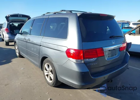 2010 Honda Odyssey Touring from USA, damaged, VIN 5FNRL3H95AB064850